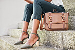 Closeup, woman and legs with shoe for fashion for career in business, law or marketing in city. Person, lawyer or solicitor by steps for briefcase, bag and commute home from office, meeting or client