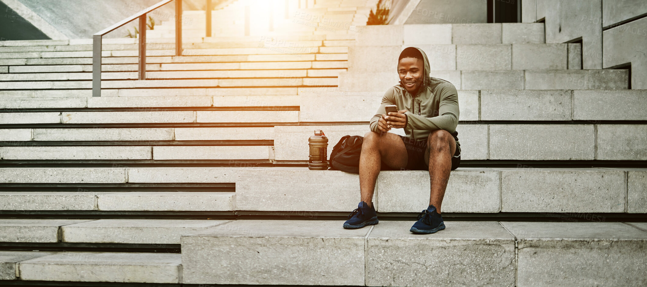 Buy stock photo Outdoor, fitness and black man with smartphone, stairs and online reading with social media, connection and relax. African person, healthy runner and athlete with cellphone, digital app and network