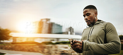 Buy stock photo Black man, phone and technology for communication, workout break or networking outdoor in the morning. Smartphone, person and connectivity for internet, conversation or social media after exercise