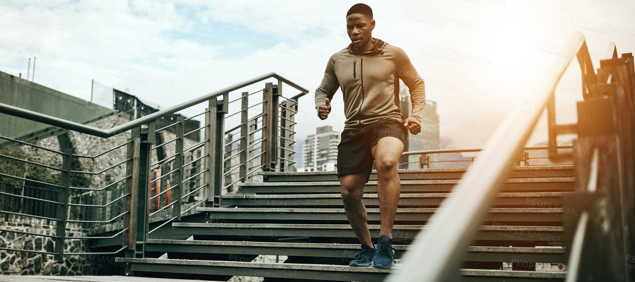 Buy stock photo Fitness, city and black man running on steps outdoor, exercise and training healthy body in the morning. Sports, cardio and African athlete on stairs for endurance workout, energy or jog for wellness