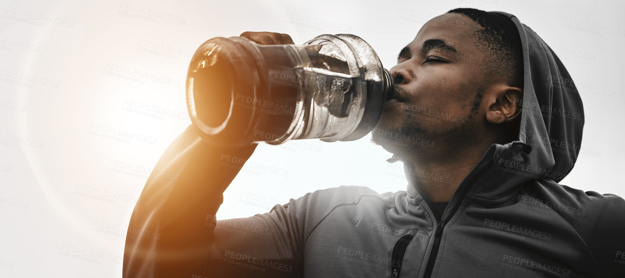 Buy stock photo Black man, fitness and drinking water on break for hydration, workout or exercise in motivation. Banner of African male person with sports or mineral drink for natural sustainability or recovery