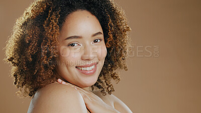 Buy stock photo Portrait  of happy woman, natural beauty mockup space or cosmetics for wellness in studio with smile. Skin glow, pride or confident biracial female model with skincare results on a brown background