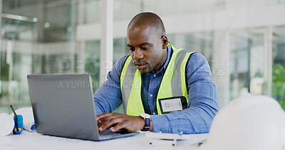 Buy stock photo Man, engineering and laptop for online planning, blueprint report and design update in office project management. African builder, contractor or architecture worker typing on computer for floor plan