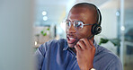 Black man, call center and consulting with headphones in customer service, support or telemarketing at office. African male person, consultant or agent talking for online advice or help at workplace