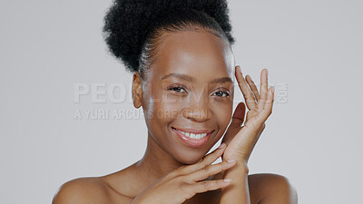 Buy stock photo Face touch, skincare and happy black woman in studio isolated on a gray background mockup space. Portrait, hands and natural beauty cosmetics of model in spa facial treatment, wellness and health