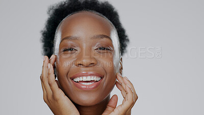 Buy stock photo Hands on face, skincare and beauty of black woman in studio isolated on gray background mockup space. Portrait, touch and happy model in spa facial treatment, wellness or natural cosmetics for health
