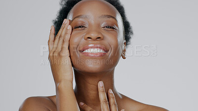 Buy stock photo Touch face, skincare and beauty of black woman in studio isolated on gray background for dermatology. Portrait, hands and happy model in spa facial treatment, wellness or natural cosmetics for health