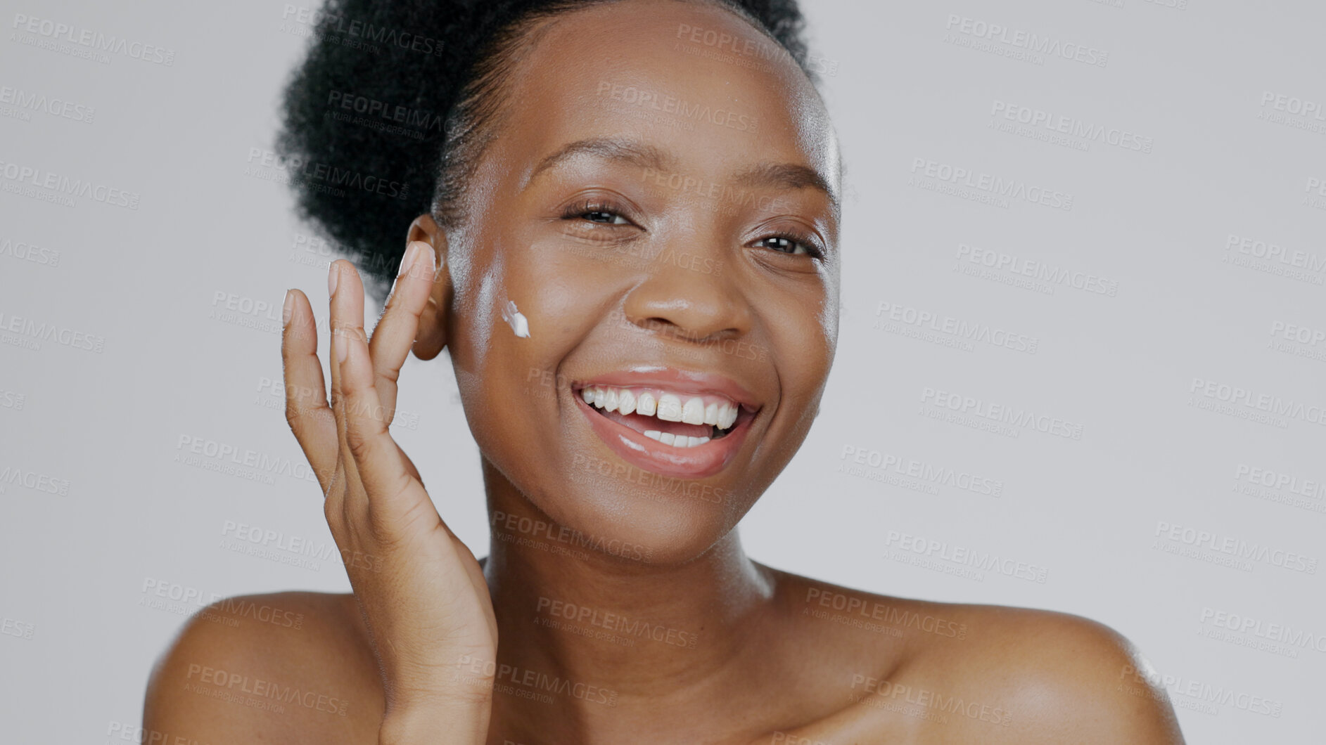 Buy stock photo Portrait, cream and face of black woman in studio for beauty, dermatology and aesthetic makeup on grey background. Happy model, sunscreen lotion and facial cosmetics for clean skincare, glow or shine
