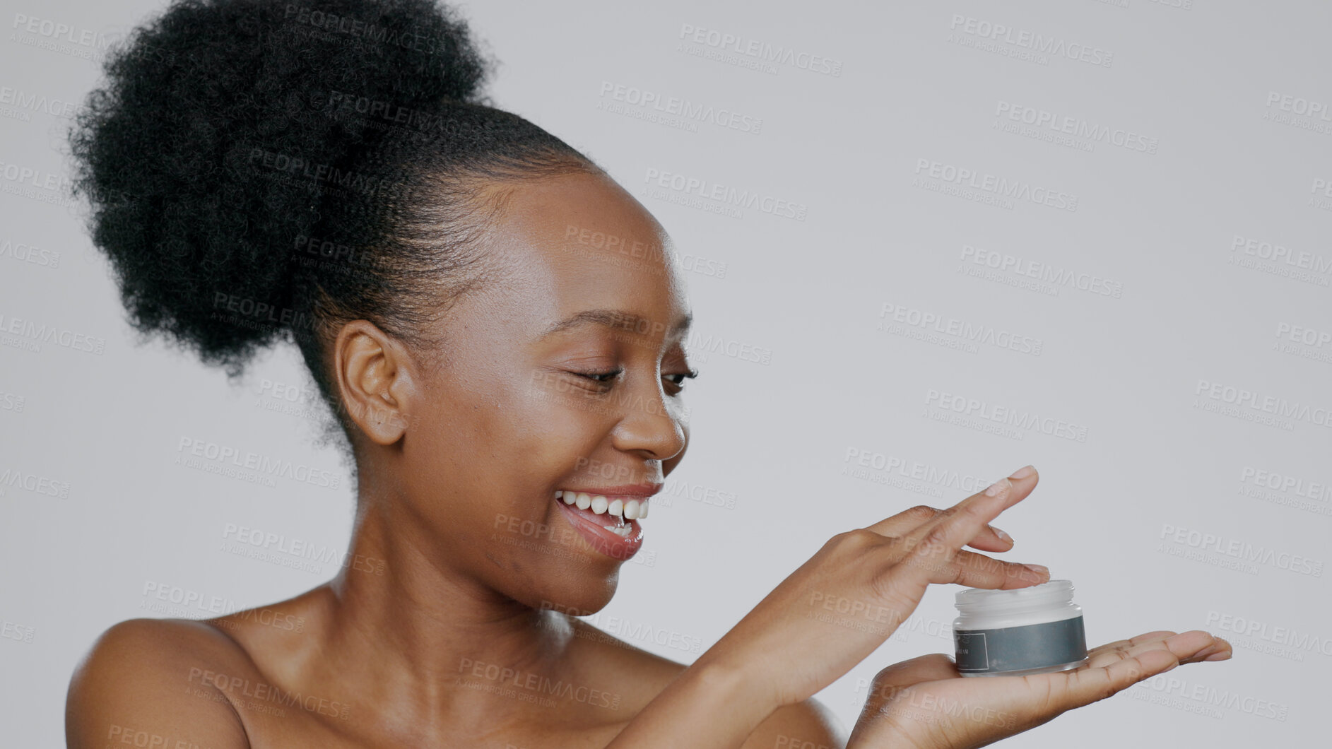 Buy stock photo Woman, face and hands with moisturizer for cosmetic, beautiful skin and happiness in facial, spa and studio background. Black model, glow and dermatology for self care, spf cream or aesthetic mockup