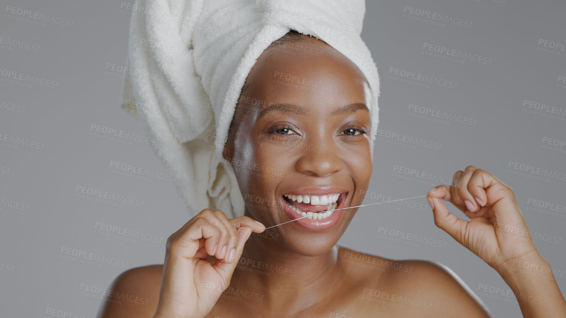 Buy stock photo Portrait, beauty and dental floss with a happy black woman in studio on a gray background for natural wellness. Oral hygiene, teeth and cleaning with a happy young model closeup for dentistry