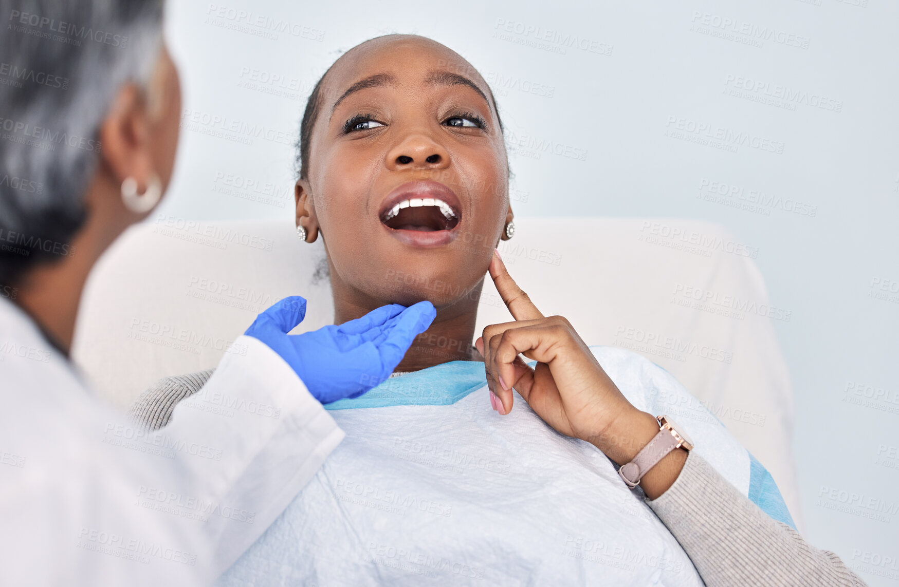 Buy stock photo Dentist, patient and women at clinic, toothache with consultation and check mouth for dental and medical treatment. Oral hygiene, healthcare and orthodontics, tooth decay with cleaning for cavity