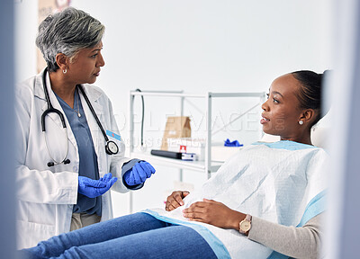 Buy stock photo Dental, consultation and dentist with woman in a clinic for oral health or teeth examination. Checkup, discussion and senior female medical worker talking to African patient in a medicare hospital.