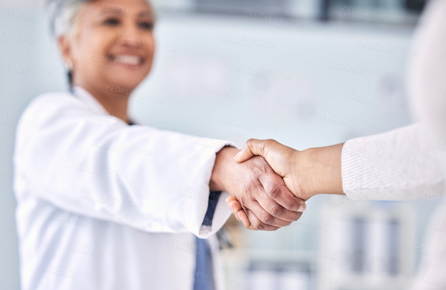 Buy stock photo Doctor, patient and handshake in partnership, meeting or deal for healthcare agreement at hospital. Happy medical professional shaking hands or person in thank you, welcome or introduction at clinic