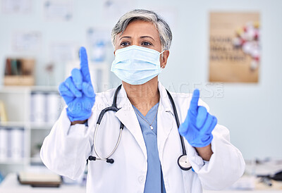 Buy stock photo Doctor, invisible screen and woman press key on technology for healthcare, wellness and telehealth. Hands, click virtual button and mature medical professional in face mask for innovation at hospital