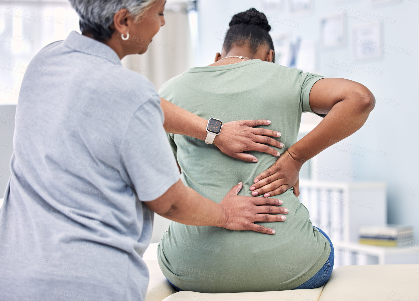 Buy stock photo Back pain, physical therapy and chiropractor with patient, spine injury and healthcare with help and people at clinic. Physiotherapy, massage and anatomy with body, support and trust in health