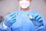 Man, doctor and hands with syringe for vaccine, injection or flu shot in surgery at hospital. Closeup of male person, nurse or medical worker with needle, vial or vaccination and antibiotic at clinic