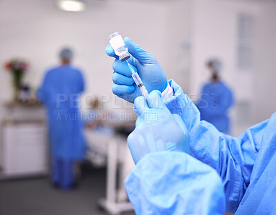 Buy stock photo Hands, healthcare and syringe with a doctor in scrubs at the hospital for treatment of disease. Medical, injection and needle with a medicine professional or surgeon getting ready for an operation