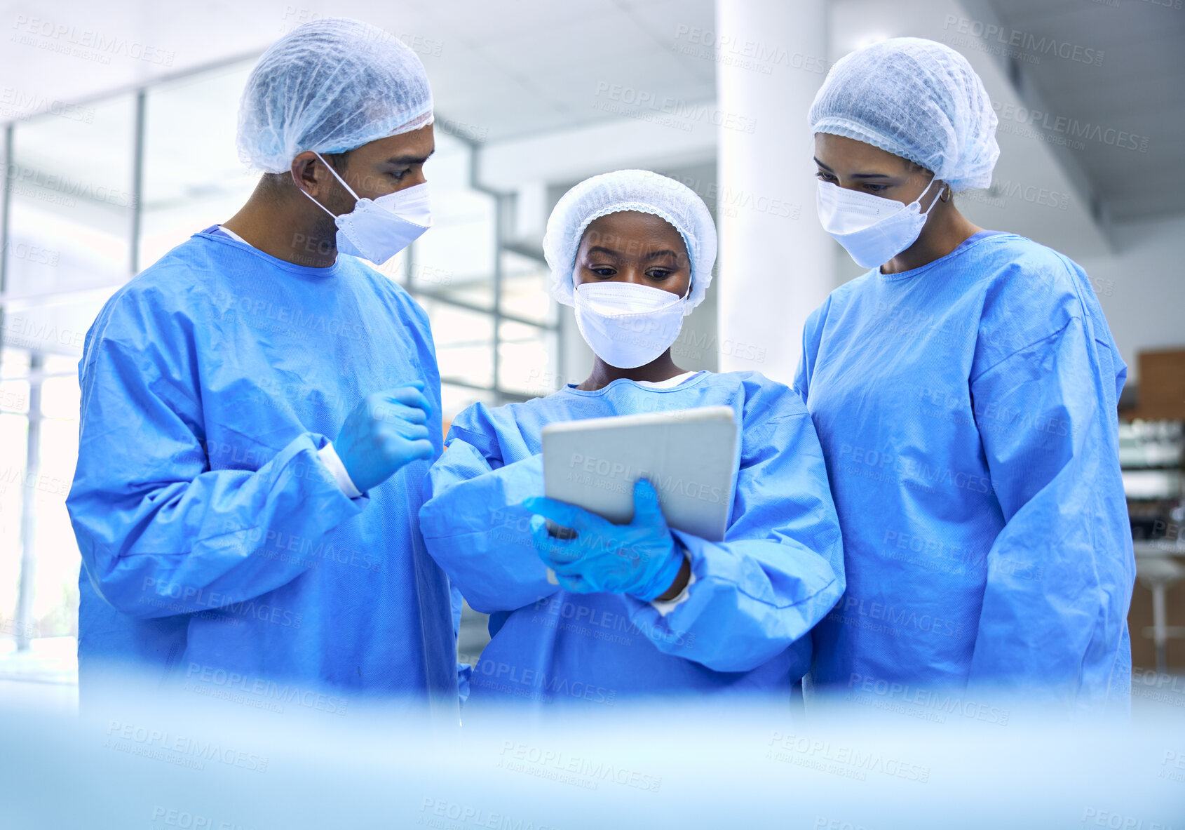 Buy stock photo Doctor, tablet and meeting with mask in planning or collaboration for surgery ideas at hospital. Group of medical employees with technology in teamwork, consulting or healthcare strategy at clinic