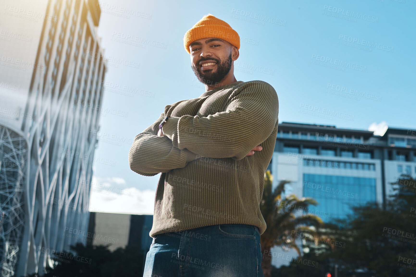 Buy stock photo Happy, man and portrait with arms crossed in city to travel or commute to university in urban, cbd or town campus. College, student or confident person smile or relax outdoor in street with buildings