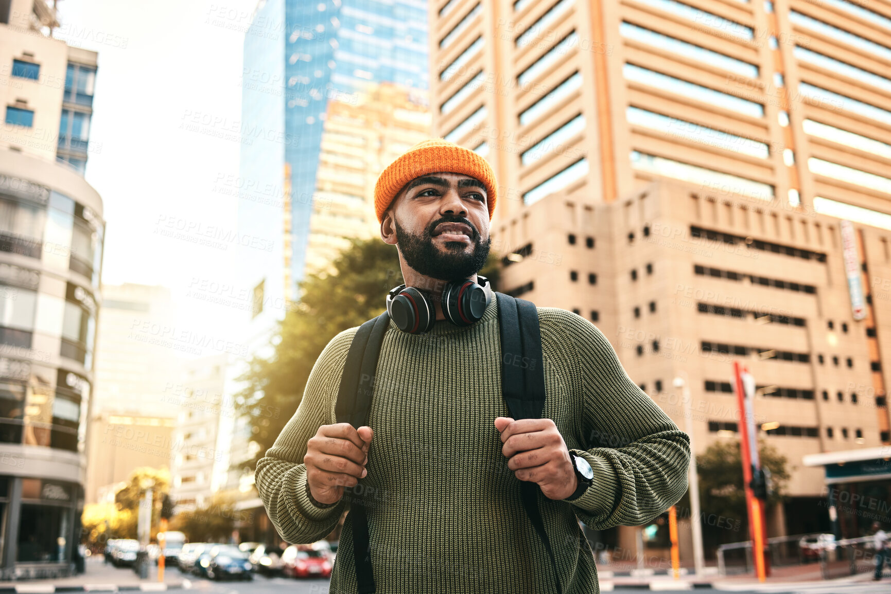 Buy stock photo City, thinking and man with ideas, travel and vision with solution, planning and gen z with headphones. Person, hipster and guy with headset, outdoor or urban buildings with fashion or stylish outfit