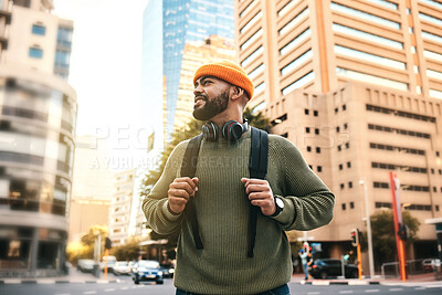 Buy stock photo Man in city, backpack and smile on morning commute to university campus for education with buildings. Opportunity, study and happy gen z college student, walking on urban street and travel to school.