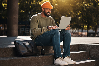 Buy stock photo Student, man and laptop at outdoor campus for university, college or scholarship research, studying or information. African person on computer for online education, website and e learning on stairs