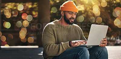 Buy stock photo Student, man and computer at outdoor campus for university, college and scholarship research or studying in park. African person on laptop streaming for online education, website or e learning banner