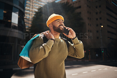 Buy stock photo Man, phone call and shopping in city with travel, walking and talking of student deal, discount or online sale in street. Happy african person with retail bag and mobile communication or outdoor chat