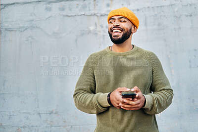 Buy stock photo Phone, excited and young man by wall networking on social media, mobile app or the internet. Technology, happy and person from Colombia scroll on website with cellphone in city by gray background.