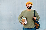 Student, portrait and backpack with books for scholarship, university or college education and learning on wall background. Happy face of african man with his bag, notebook and studying or research