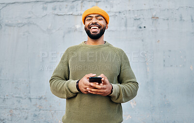 Buy stock photo Cellphone, smile and portrait of man by wall networking on social media, mobile app or internet. Technology, happy and person from Colombia scroll on website with cellphone in city by gray background