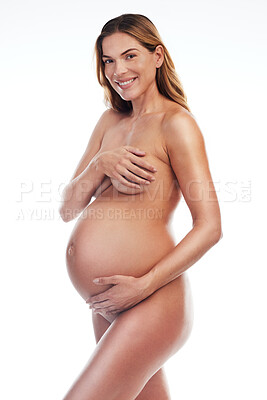 Buy stock photo Nude body, portrait of happy pregnant woman on white background and ivf wellness, aesthetic beauty and healthy glow. Motherhood, pregnancy stomach and naked mother holding breast isolated in studio.