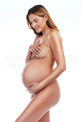 Buy stock photo Naked body, happy pregnant woman and stomach on white background for ivf wellness, aesthetic beauty or healthy glow. Motherhood, pregnancy and profile of nude mother holding breast isolated in studio