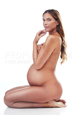 Buy stock photo Naked portrait of pregnant woman sitting in white background for ivf wellness, aesthetic beauty and healthy body glow. Motherhood, pregnancy stomach and nude mother isolated in studio for health care