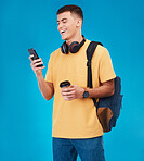 Male student, smile and smartphone while texting in studio with mockup for communication on blue background. Person, man and laugh at joke for university, college or work on social media, meme or web
