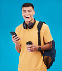 Student, man and smile with phone, coffee and portrait in studio by blue background. Asian male, ready and portrait for university, scholarship and education, smartphone and online registration on web