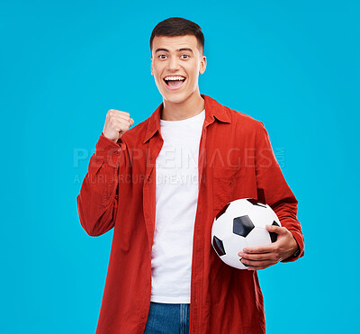Buy stock photo Soccer ball, excited and portrait of man on blue background for sports, winner and achievement. Happy, football fan and person cheer for team success, winning match, game and tournament in studio