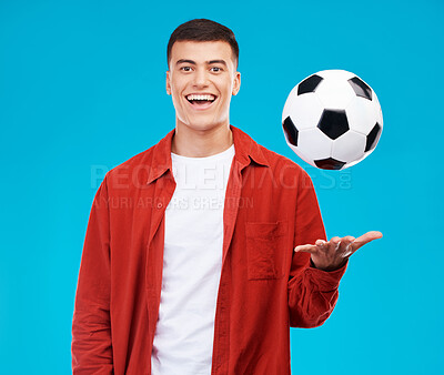 Buy stock photo Man, portrait and soccer ball for sports game in studio, active athlete or fan with fitness isolated on blue background. Happiness, football and training for match with competition and supporter 