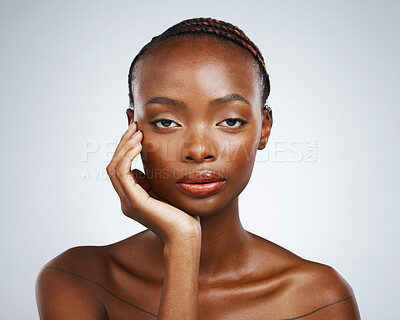 Buy stock photo Portrait of black woman, natural beauty or glow with wellness in studio with an aesthetic shine. Dermatology, clean face or confident African girl model with skincare results on white background