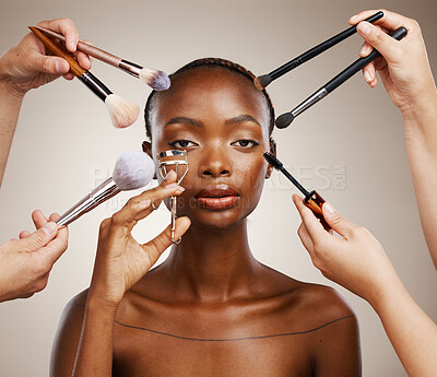 Buy stock photo Tools, hands and portrait of black woman and cosmetics for getting ready, beauty product and glow. Brush, group and people with equipment for an African model, makeup and artist application in studio