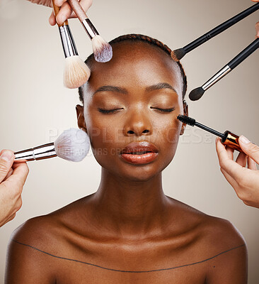Buy stock photo Makeup, brushes and black woman with cosmetics, skincare and dermatology on grey studio background. African person, wellness or model with tools, grooming and treatment with luxury or shine with glow