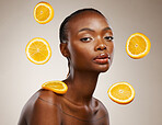 Black woman, skincare or facial treatment with orange, beauty and cosmetics for healthy skin, vitamin c or face. Portrait, model and glow for dermatology, natural and vegan with citrus, clean or face