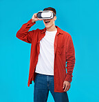 Man, wow and VR or futuristic glasses for gaming software, digital world and fantasy vision on a blue background. Excited person watch in 3d video, virtual reality technology and metaverse in studio