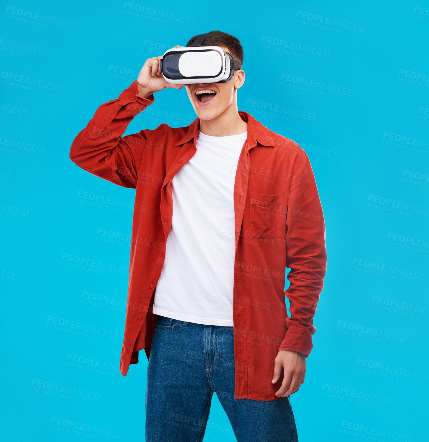 Buy stock photo Man, wow and VR or futuristic glasses for gaming software, digital world and fantasy vision on a blue background. Excited person watch in 3d video, virtual reality technology and metaverse in studio
