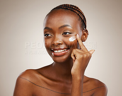 Buy stock photo Black woman, skincare and smile with cream, beauty and cosmetics for healthy skin, lotion and facial. Model, wellness and glow for dermatology, natural and clean on face, sunscreen and moisturizer