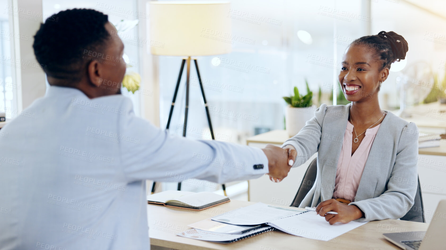 Buy stock photo African man, woman and handshake at interview, recruitment and hiring with agreement for job in office. Human resource expert, black business owner or manager with smile, shaking hands and onboarding