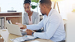 Black people, laptop and teamwork for business at desk, brainstorming and planning strategy together in office. Computer, collaboration and consultants at table in discussion for research project