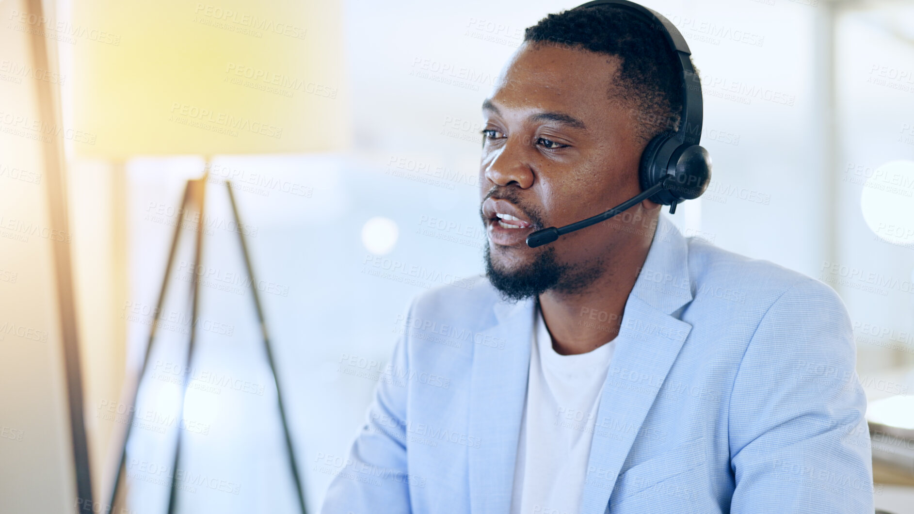 Buy stock photo Call center, crm and black man talking for telemarketing, tech support or contact us at help desk in office. Customer service, sales agent and serious consultant in communication, advice and business