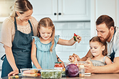 Buy stock photo Family in kitchen, cooking together with children and teaching, learning and nutrition with parents. Mom, dad and girl kids help making healthy food in home with care, support and love at happy lunch