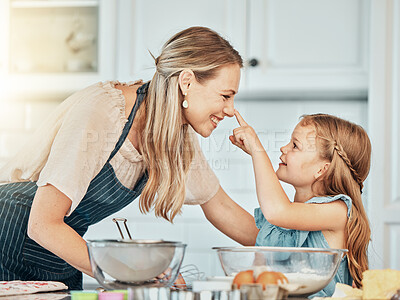 Buy stock photo Playful mom in kitchen, baking together with kid and happy learning, nutrition and morning with woman. Smile, mother and girl child, cooking or playing in home with care, support or love at breakfast